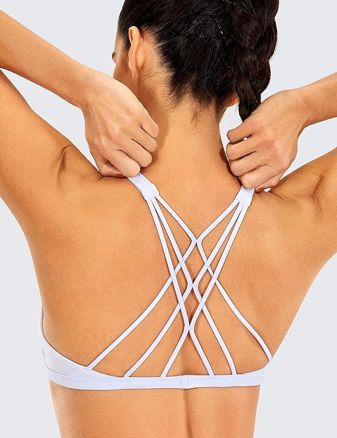 CRZ YOGA Women's Strappy Sports Bra - Criss Cross Back Padded Low Impact Sexy Cute Workout Yoga B... | Amazon (US)