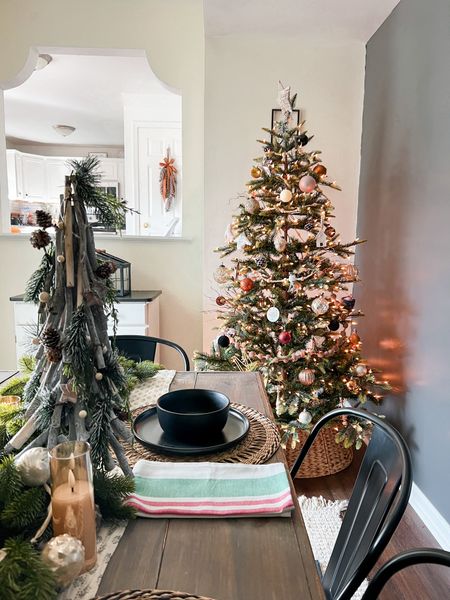 Added this Amazon Christmas tree from Amazon to our dining room this year and I just love how it turned out! Here’s a sneak peak at our holiday dining tablescape :)

#LTKhome #LTKSeasonal #LTKHoliday