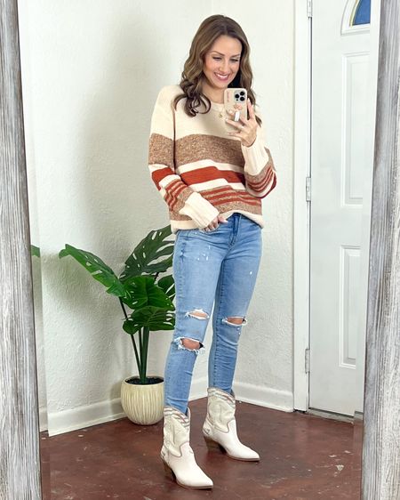 Love this tan and rust striped sweater! It’s so cozy!!! Also hits just below the booty for a legging friendly look but it’s not tunic length just fyi. Will style it like that soon. Wearing a size small. Jeans are old but linking the updated version. Wearing a 0 short. White western booties are tts and a fav! I have them styled many ways throughout my feed! 

#LTKSeasonal #LTKunder50 #LTKHoliday