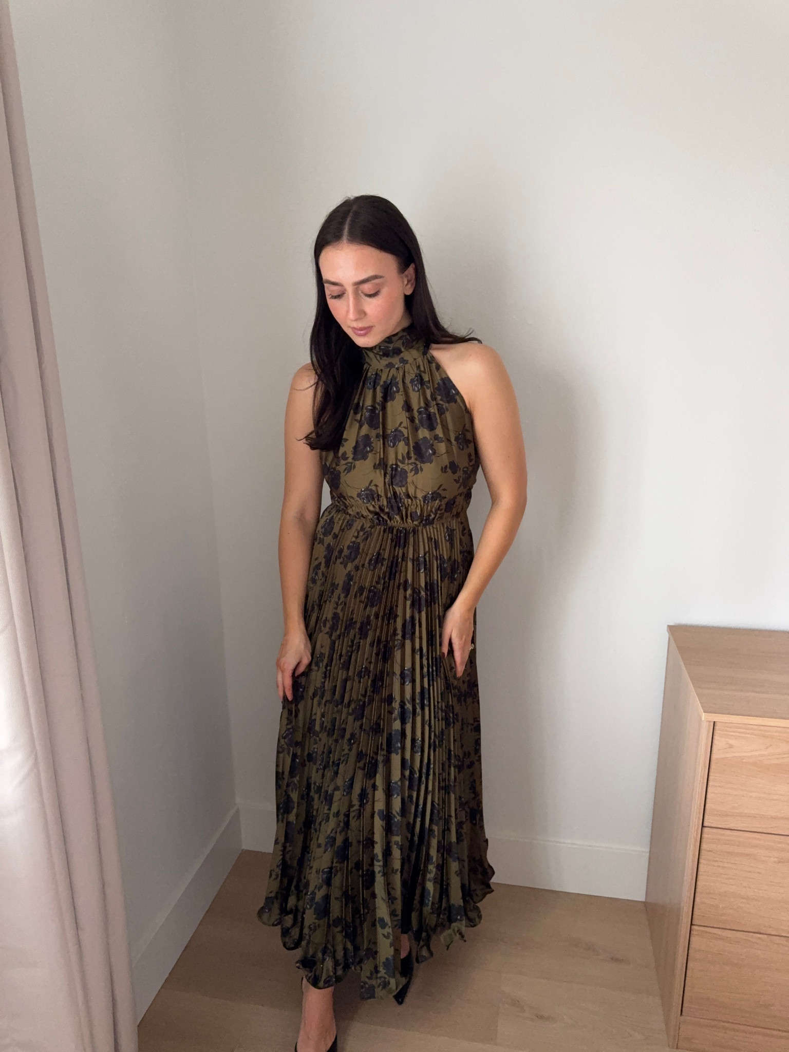 Wearing this halter dress in a size 2. Perfect for special occasions!!

#LTKstyletip #LTKfindsunder100 #LTKwedding