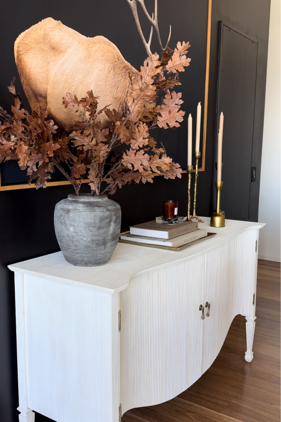 Organic Modern fall decor🍂

Console styling, fall decor, autumn decor, taper candle holders, coffee table books, brass tray, rustic vase, fall stems

#LTKStyleTip #LTKHome #LTKSeasonal