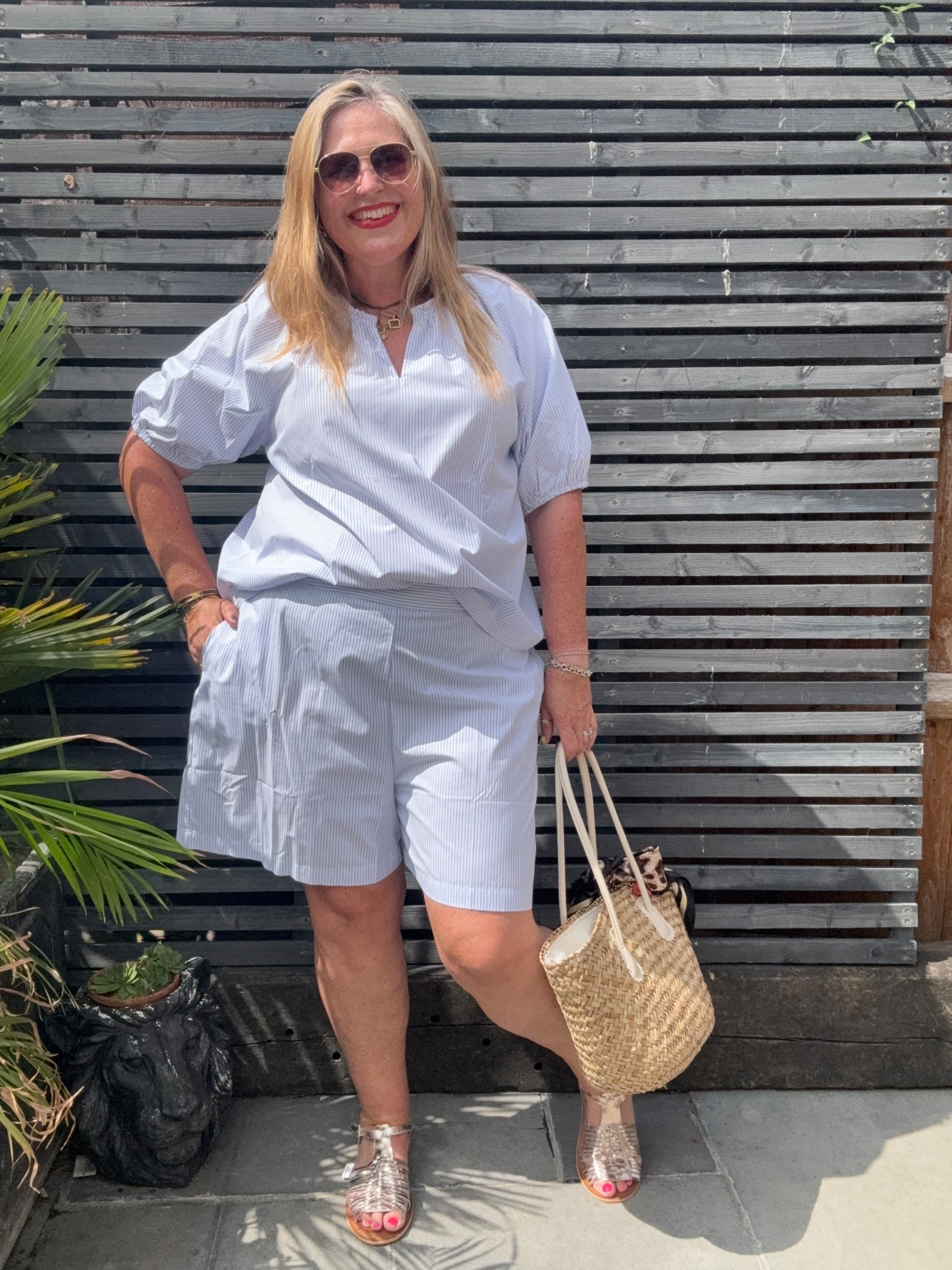 Blue striped shirt, blue striped shorts coord set, gold sandals, gold sunglasses, straw bag 

#LTKsummer #LTKplussize #LTKcurves
