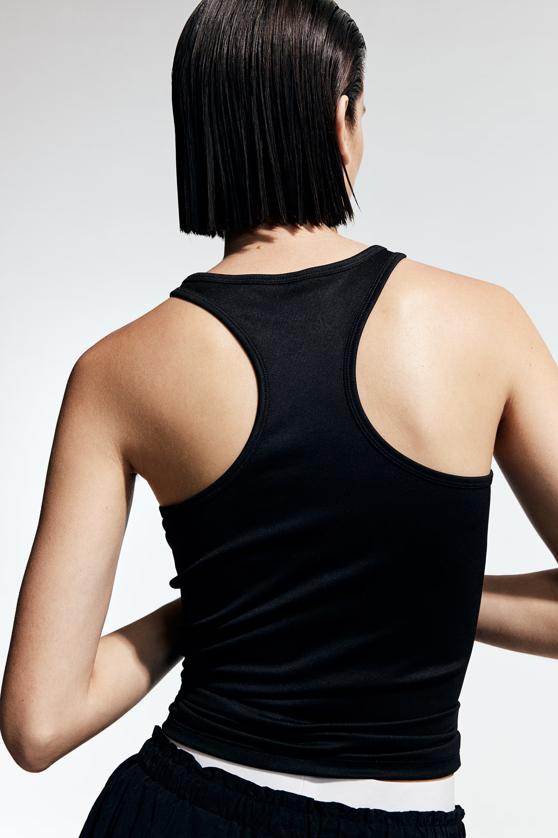 Ribbed vest top - Round neck - Sleeveless - Black - Ladies | H&M GB | H&M (UK, MY, IN, SG, PH, TW, HK)