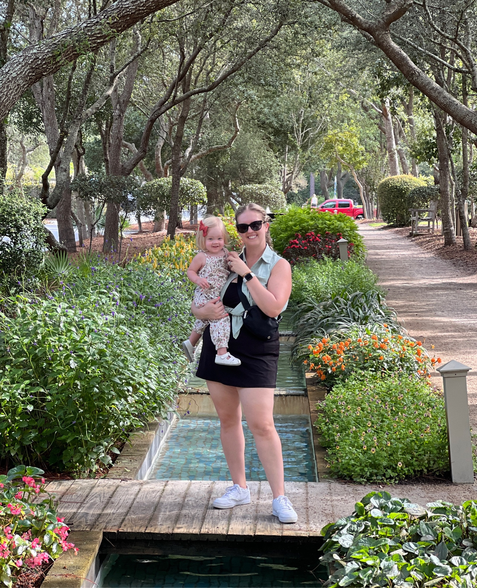 living our 30a dreams in water color in this beautiful part of town. my black tennis dress was perfect for this hot day with a button down tank over it tied in a knot. perfect for keeping cool, cute, preppy and still being perfectly comfortable with the family. white sneakers are my go-to, wearing true to size as my normal running shoes.

toddler tie sleeve romper and bow also tagged. was a great warm weather vacation outfit. the long linen pants m the baby romper kept the sun at bay!

#LTKtravel #LTKmidsize #LTKSeasonal