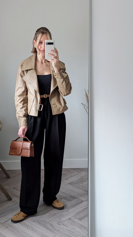 I wasn't sure about the trainers on this one? But I'm trying to shop my wardrobe and style items I didn't wear enough last year. Neutral leather jacket is Boda Skins and I have linked similar, plus a pre-loved jacquemis handbag for nearly half the price.  #leatherjacket #neutrals #blacktrousers 

#LTKSeasonal #LTKfindsunder50 #LTKeurope