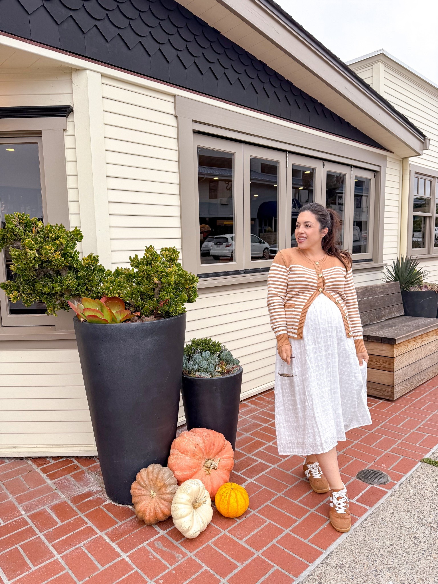 Quick maternity fall outfit? Oversized skirt, cardigan and sneakers. Comfortable cute and little dressed up with the skirt but down with the sneakers!

#LTKStyleTip #LTKBump