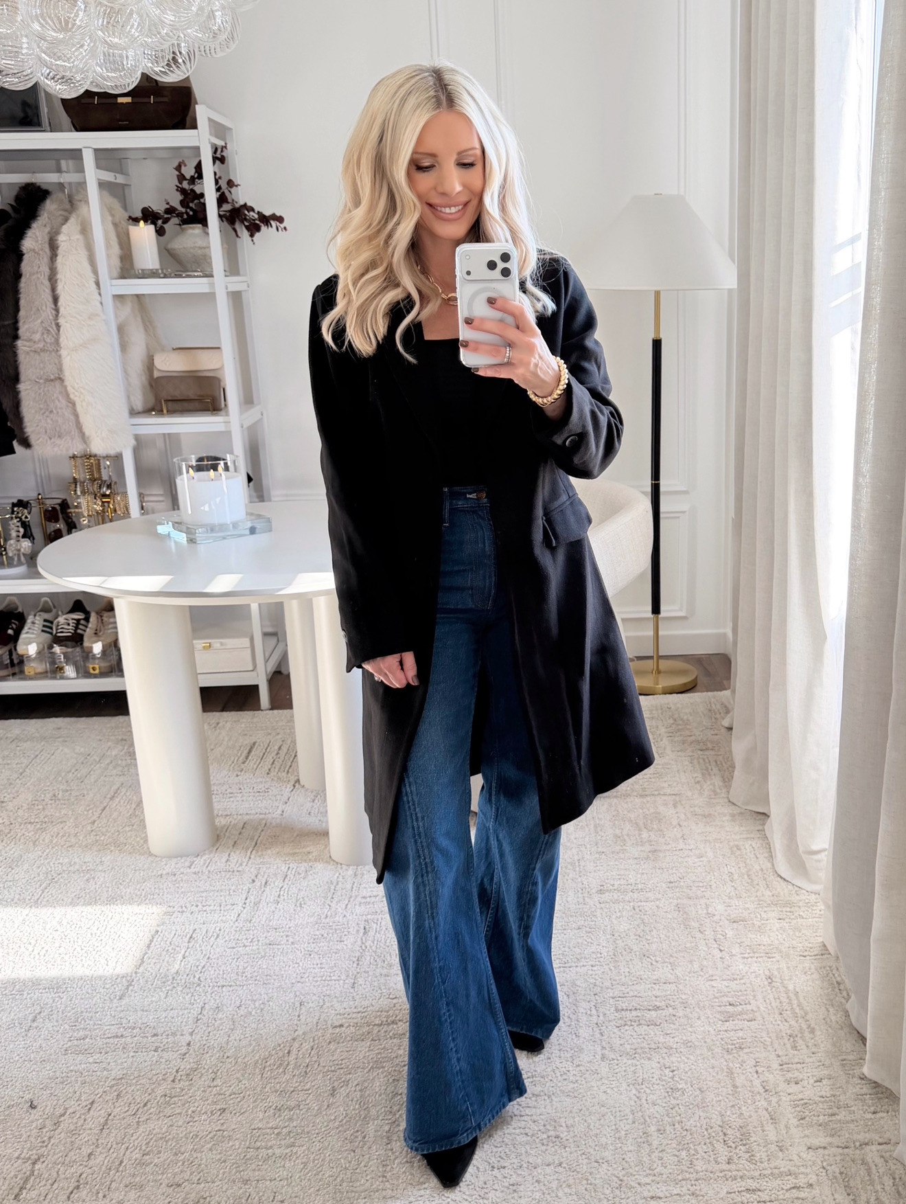 BLACK COAT AND WIDE-LEG DENIM OUTFIT. This look is one of my favorite polished neutrals — a clean black coat layered over a fitted black top with wide-leg denim for a long, tailored silhouette. The coat adds structure and instantly elevates the entire outfit, while the denim keeps it modern and effortless. It’s an easy, everyday combination that feels chic for errands, lunch, or a casual evening out.

#Amazon #TheHillaryStyle #AmazonFashion #NeutralStyle #ChicOutfit #FallAndWinterStyle #ElevatedEssentials #DesignerLookForLess #MinimalWardrobe #EverydayOutfits #PolishedBasics 

 

#LTKSeasonal #LTKOver40 #LTKFindsUnder100