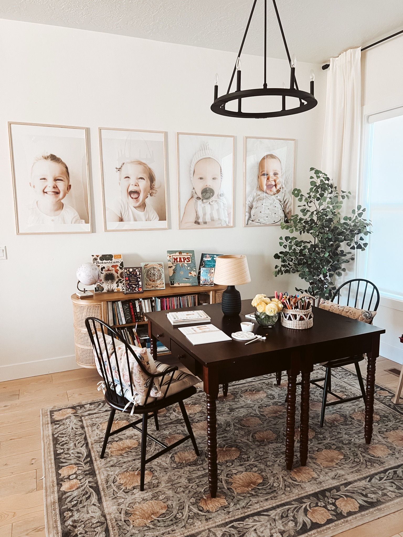 Where learning meets love✨ One of the spaces I’m most excited about in our new home build is our homeschool room. It’s been tough trying to make workspace for our kiddos in our rental in the short-term, but I believe a beautiful, functional workspace for your kids is possible even in small nook spaces.

From oversized portraits capturing the sweetest smiles to a bookshelf filled with adventure, this little corner is where our curiosity grows for now. 🌿📚 

#LTKBaby #LTKFamily #LTKHome