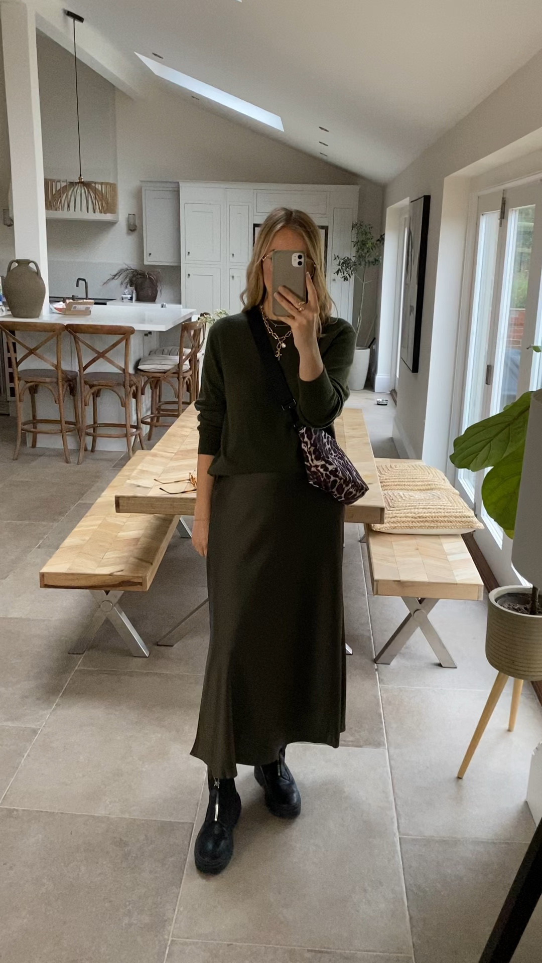 Perfect ‘special’ skirt that you can wear again and again. 
It’s a great weight , doesn’t cling and drapes beautifully - I’m wearing the large regular length - waistband is elasticated.  (Shorter length skirt linked below as well) 
Cashmere sweater is borrowed from the boys , wearing a medium. 
I’ve linked a cashmere cardigan which works really well tonally if you prefer a v neckline . Boots are old but I’ve linked similar. 