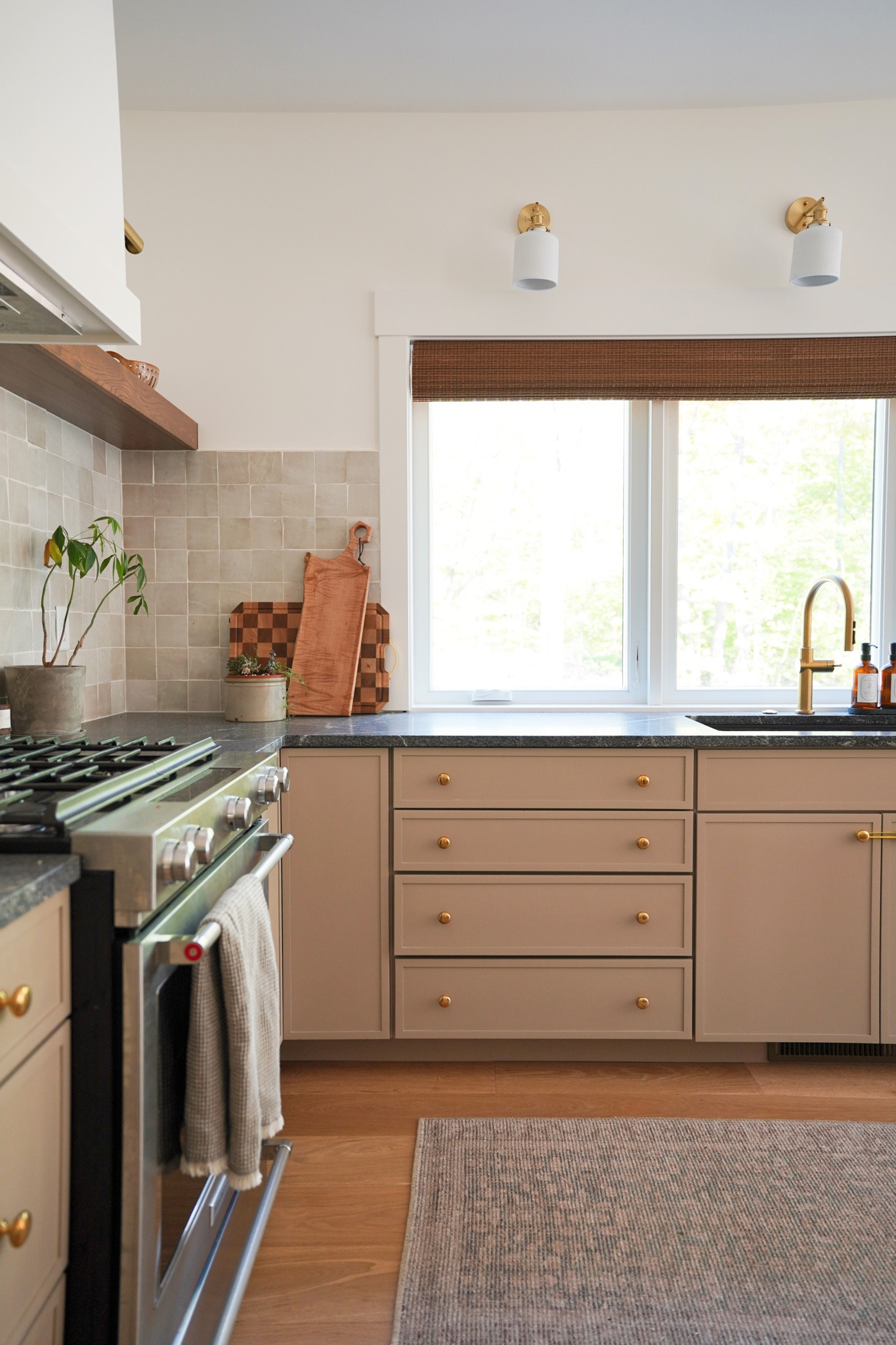 These woven shades have added so much warmth to our kitchen! This is the color “Madrid Cafe.” We went with no additional liner (as I wanted light to still come through when they are closed for privacy), a valance, inside mount installation, and with a continuous cord (because otherwise I wouldn’t be able to reach them when pulled to the top). 

#LTKFind #LTKhome