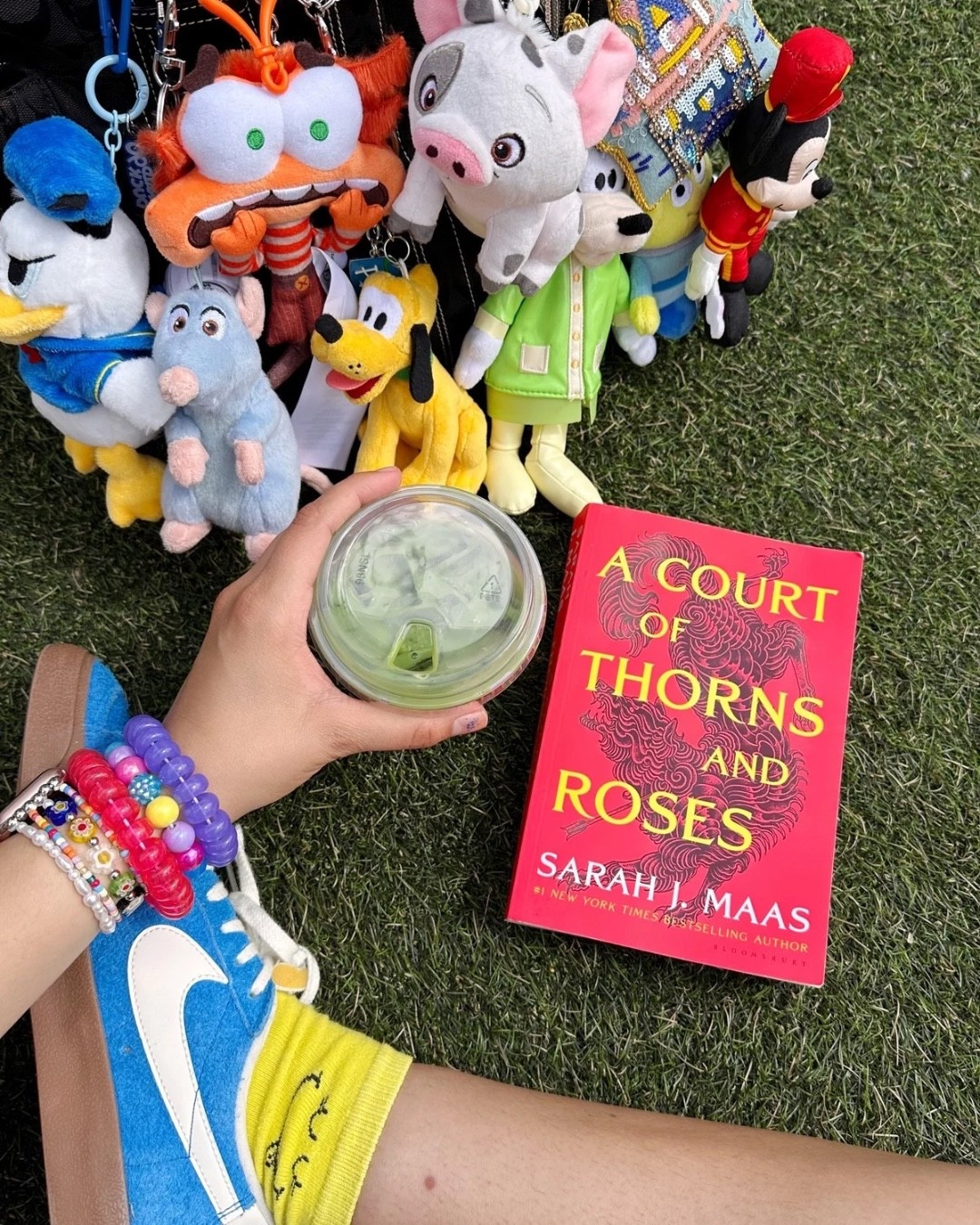 Reading at Disneyland #disneyland #reading #books #fantasybooks #booktok #bookseries #acotar 