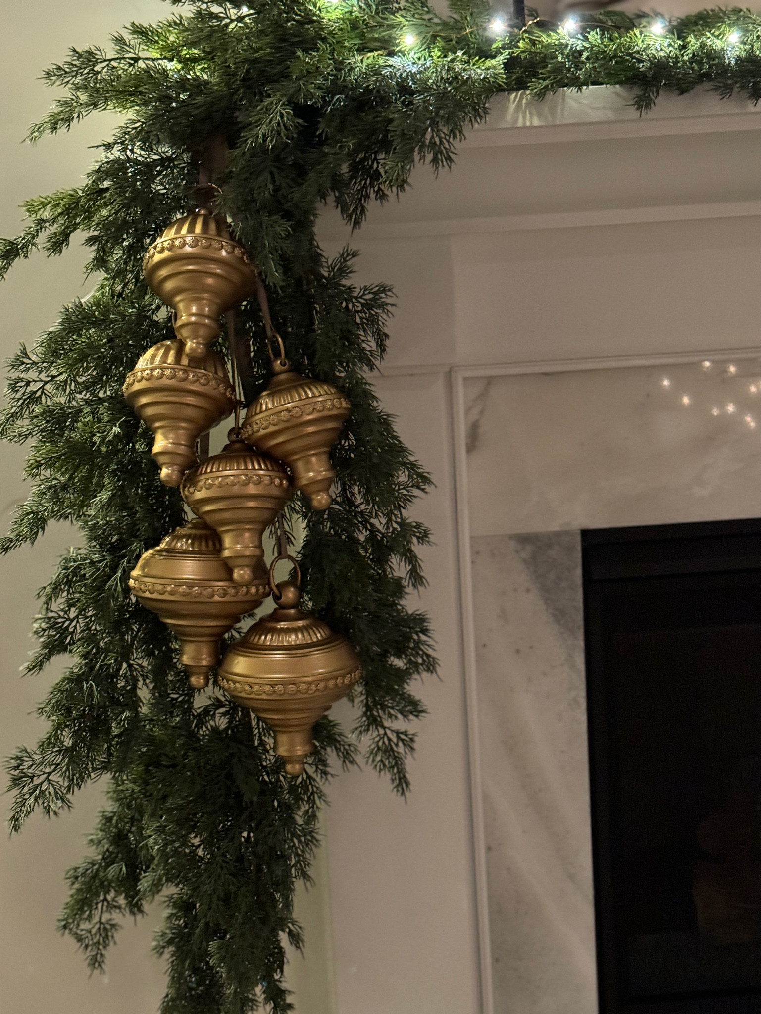 A sneak peak preview of the fireplace mantle faux garland afloral Sullivan 

#LTKVideo #LTKSeasonal #LTKHome