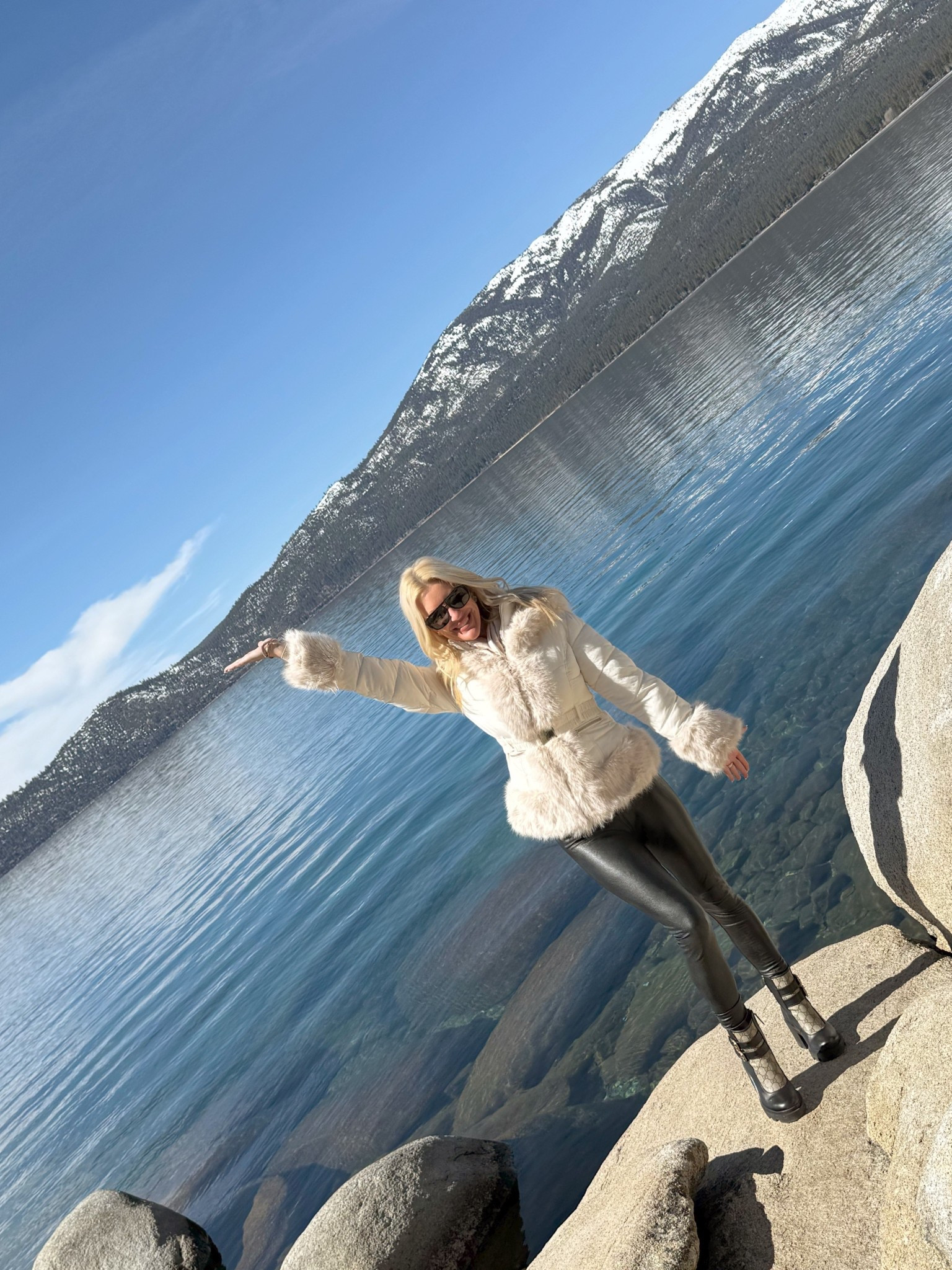 Lake Tahoe in spring. Leather legging. Louis Vuitton scarf. Fur puffer. Gucci boots. D&G sunnies. Sunglasses. Mountain style  

#LTKStyleTip #LTKTravel #LTKBeauty