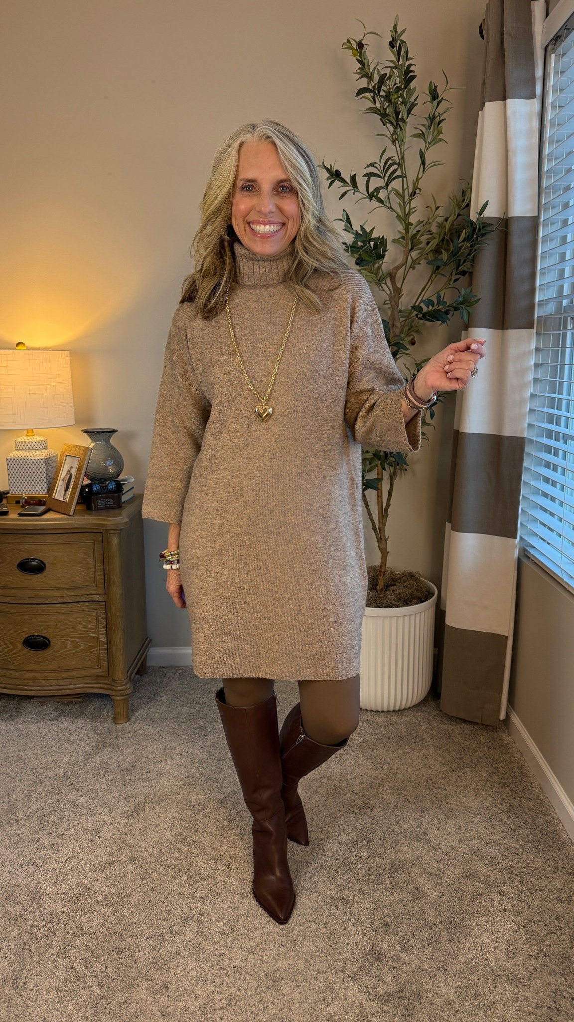 The best sweater dress I’ve ever tried. Wearing fleece lined tights that are so cozy. Think about wearing them under pants if you’re going to a parade or night light show. Use code COAST25 on Erin McDermott and COAST20 on Allie + Bess 

#LTKSeasonal #LTKHoliday #LTKOver40