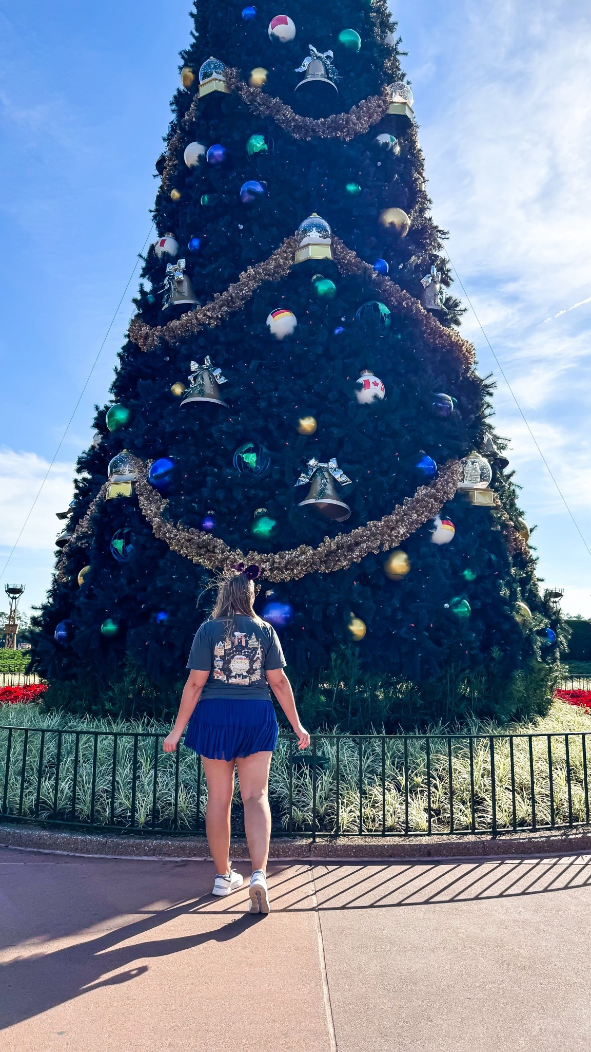 Epcot festival of the holidays outfit inspo - graphic tee with the world showcase counties decorated for Christmas from Etsy (size large), sapphire pirouette skirt from Popflex (size large), ears from Etsy - pixiedusteardesigns (these are sold out but linking another pair of Christmas ears from her bc her shop has so many good options), on cloud Rogers (size 9 1/2)

Midsize, midsize outfit, size 10, ootd, Outfit inspo, Disney Christmas finds, Disney parks Outfit, Disney bound,  under $50 outfit, affordable outfit, casual outfit, Disney princess , Etsy finds, Disney outfit, Mickey ears, minimal Disney style, #ltkdisney, Disney ears, Disney aesthetic, theme park outfit, Disney parks outfit ideas, comfy Disney outfit, small business finds,

#LTKSeasonal #LTKootd #LTKHoliday