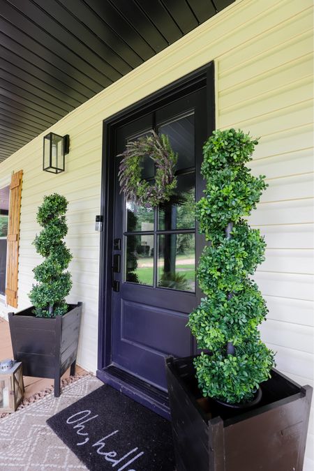 Spring front porch
Front door wreath, boxwood trees, artificial trees, faux greenery, welcome mat, front porch decor, artificial flowers, potted plants 

#LTKSeasonal #LTKstyletip #LTKhome