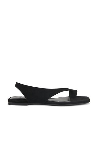 Toteme Suede Thong Sandal in Black - Black. Size 37 (also in 38). | FWRD 