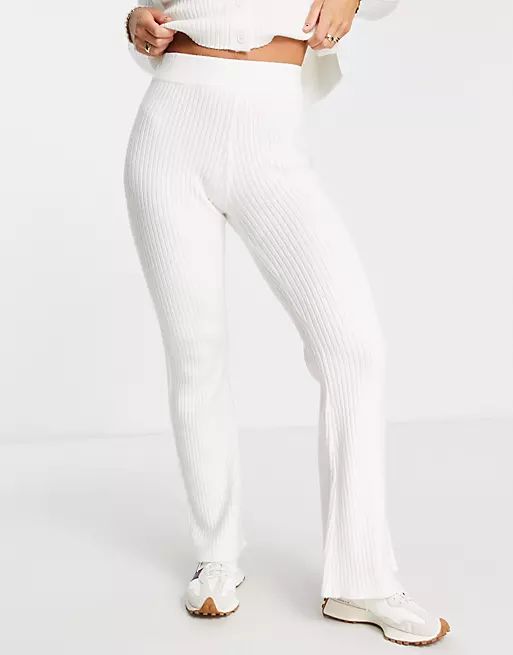 ASOS DESIGN knitted flare pants in cream | ASOS (Global)