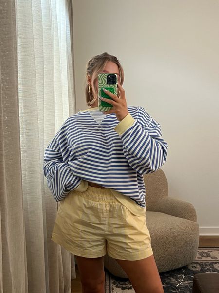 Size down in sweatshirt to a small! Shorts are on sale for $12?!?!? Stick with true size they are super stretchy and these are a bit too loose! Cute affordable boxer style!! 

