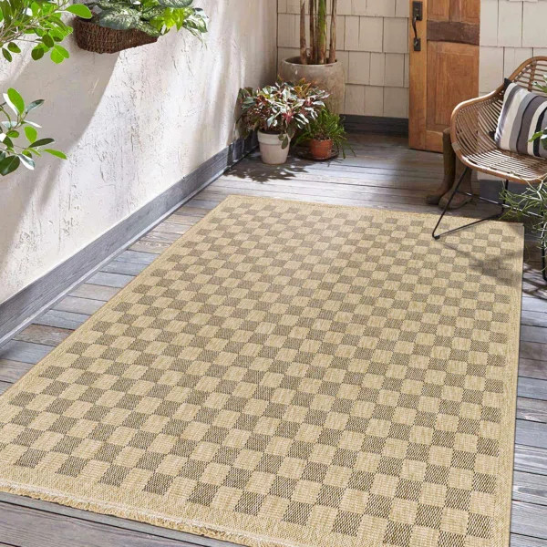 Abbie Checkered Machine Woven Polypropylene Indoor / Outdoor Area Rug in Beige/Black | Wayfair North America