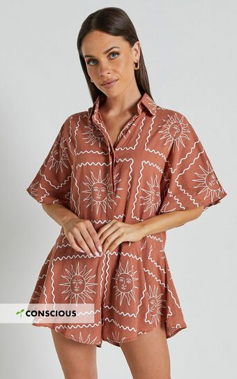 Amarie Playsuit- Short Sleeve Relaxed Button Up Playsuit in Rust Sun Print | Showpo (US, UK & Europe)