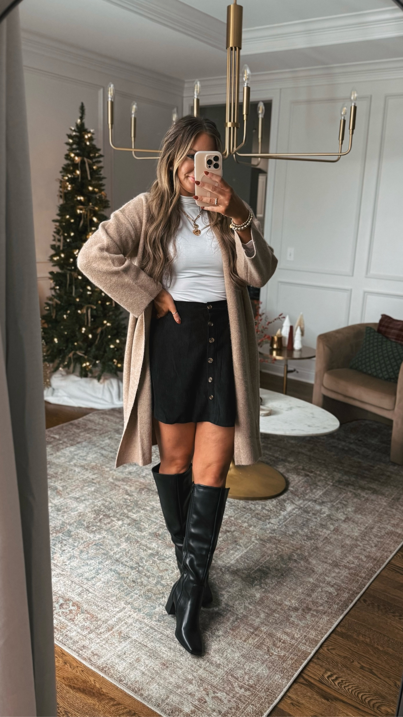 This fall outfit is perfect for your Thanksgiving outfit or a casual date night outfit. The skirt is so cute with the button details and the cardigan sweater will be worn with multiple different outfits this fall and winter. Also I’m loving these black boots! All from Amazon!

#LTKHoliday #LTKFindsUnder50 #LTKStyleTip