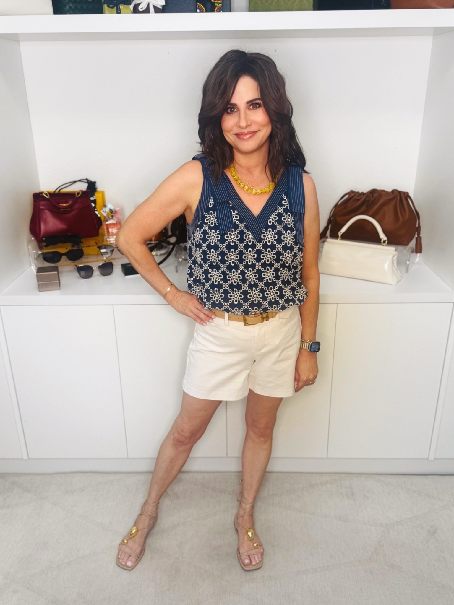 This top is dainty and beautiful! Has sewn on bows and eyelet. Wearing an XS . It is fully lined . Shorts XS

#LTKOver40 #LTKootd #LTKSaleAlert