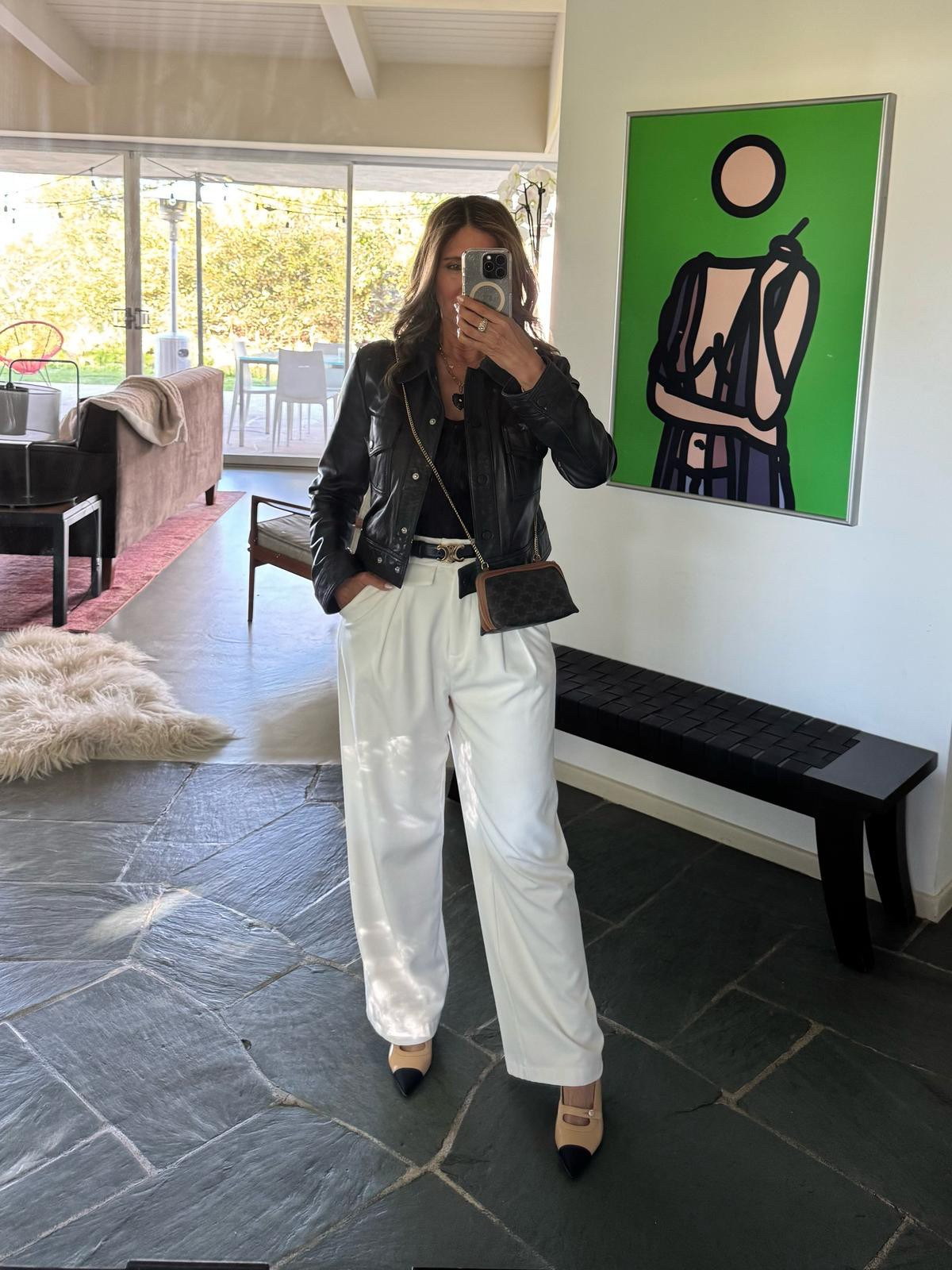 Effortless chic with a classic black and white combo ✨ A leather jacket to edge it up, wide-leg trousers for that relaxed vibe, and two-tone heels to tie it all together. Obsessed with how this look balances edgy and elegant! Plus, this mini crossbody is my go-to for hands-free style! #LTKfashion #ClassicStyle #ChicAndTimeless #EffortlessOutfits #WardrobeEssentials

#LTKU #LTKFindsUnder100