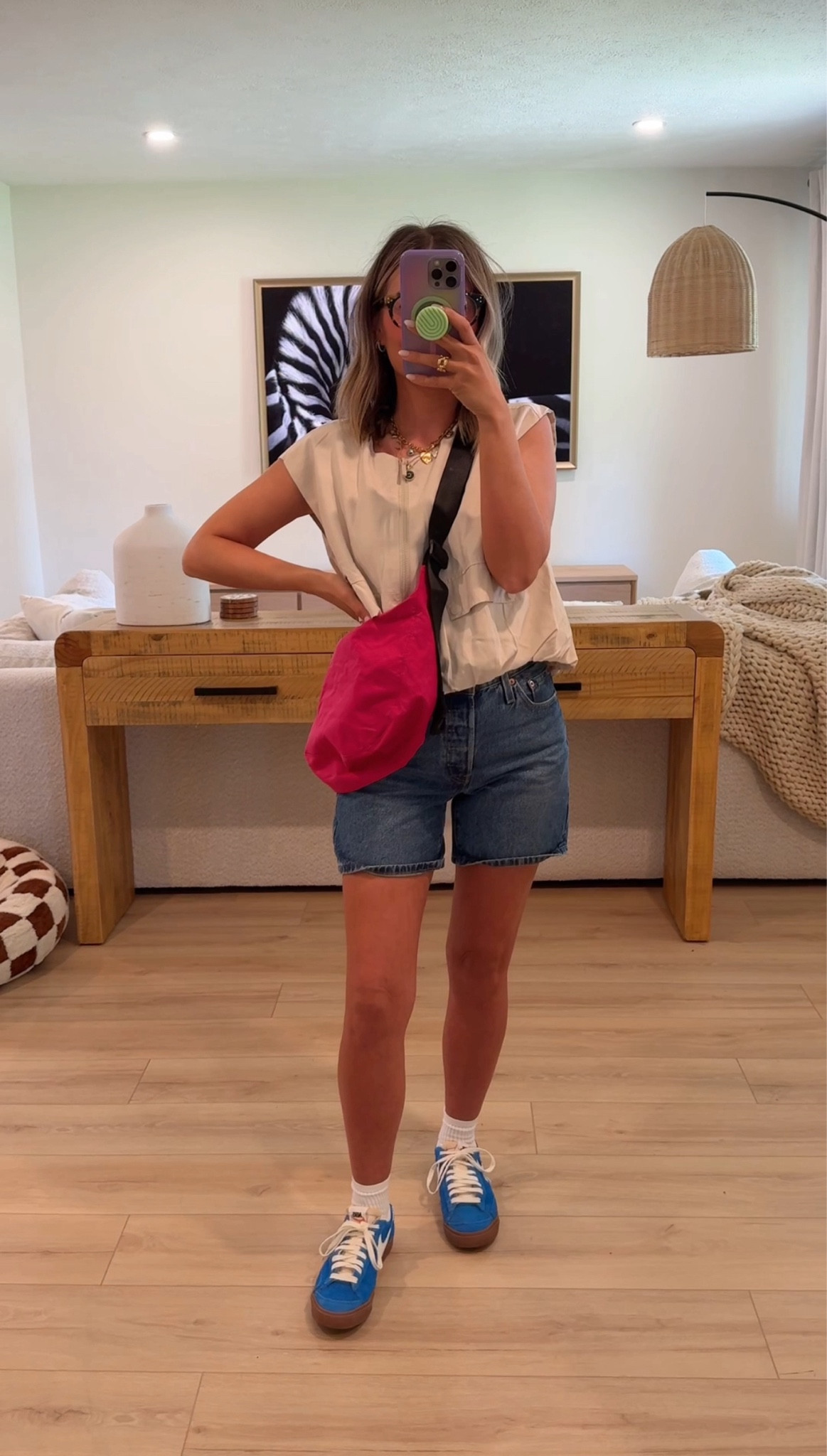 I’m wearing size small in the vest and 25 in the shorts. Sized up bc they run small! Medium in the bag!