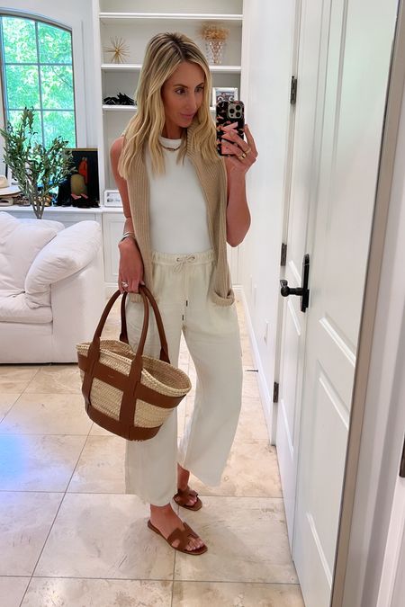 My favorite easy linen pants, white tank, and straw bag. Perfect for everyday this summer. 

Get your normal size in the pants. I take the size small. They come in so many amazing colors! 

#LTKStyleTip #LTKFindsUnder100 #LTKItBag