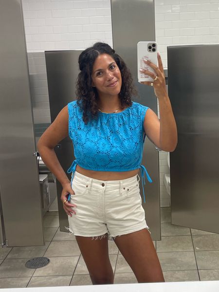 Hot summer nights call for crop tops and shorts. Loved the blue of this eyelet tanya Taylor top paired with cream madewell shorts. I threw on gold slides to complete the look!

#LTKstyletip #LTKSeasonal #LTKunder100