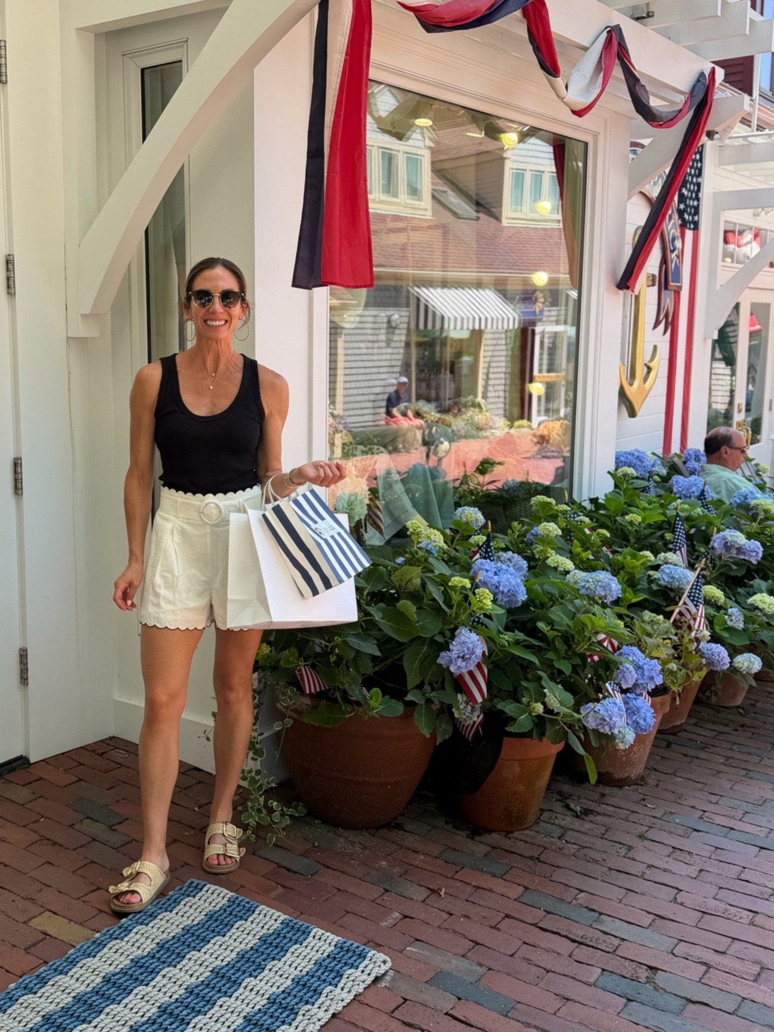 I just spent the weekend in Rhode Island and I’m sharing every outfit I packed and wore! These white and black linen scallop shorts come with a matching button up top. I paired it with a simple black tank top from Amazon. ￼