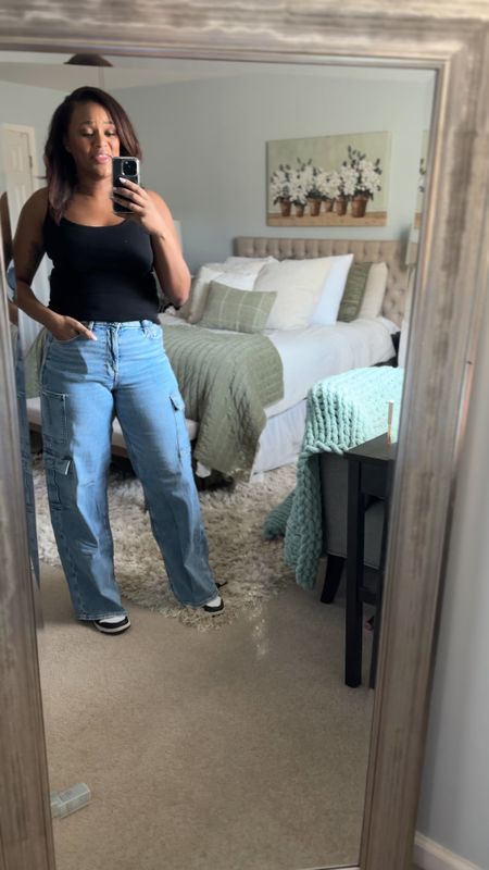 My favorite cargo jeans ! They pair perfectly with a tank or any t shirt. You can get them shorter if you think they are too long but I love the baggy look with a tighter top!  

#LTKFindsUnder100 #LTKVideo #LTKSaleAlert