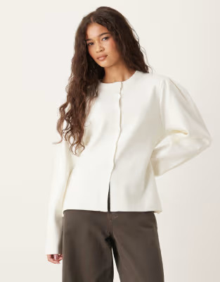 ASOS DESIGN structured knit nipped waist puff sleeve cardigan in cream | ASOS (Global)