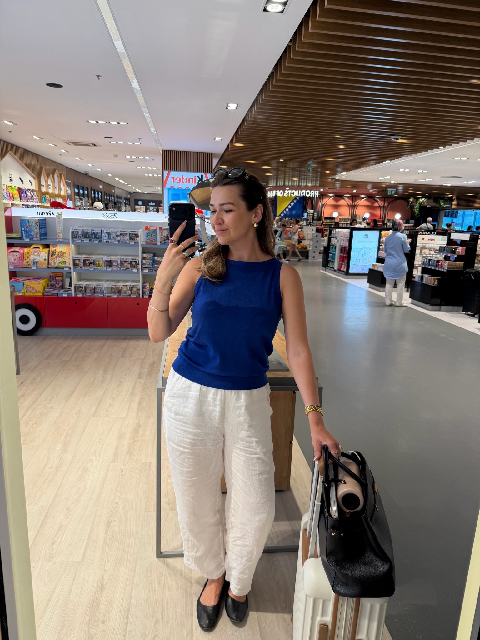 Comfy summer travel outfit 💙

Top @Aritzia is lightweight merino wool which is moisture wicking - keeps you cool!
Bottoms @Quince linen stretchy waistband + I love the length on them! I’m 5’7 and they hit just below the ankle 
Flats are @Margaux leather ballerinas 
Bag is the stunning DeMelier 🖤
Carey on is @Bagsmart and so chic! she survived the cobblestones of Europe 🤣🫶🏻

#LTKootd #LTKTravel #LTKSeasonal