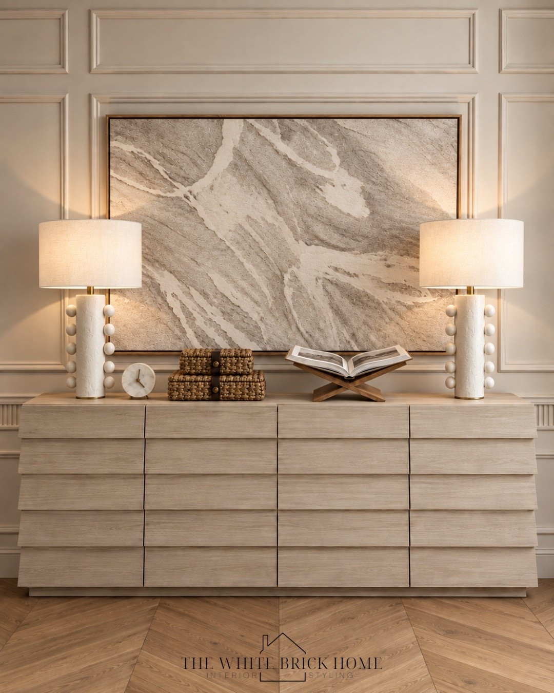 Warm neutrals, sculptural details, and natural textures come together for an effortlessly elevated statement. 

Sideboard, sideboard styling, wall art, table lamp, lamps, home decor, home accessories, home accents