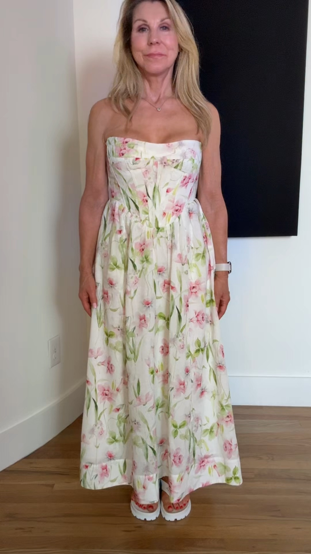 This strapless little sundress is almost down to the ground on me (I’m 5’3”) Tge pink flowers and green vines give off summer vibes! I’m wear flip flops but swamp them out for a wedge and summer wedding here you come!! 

#LTKWedding #LTKOver40 #LTKStyleTip