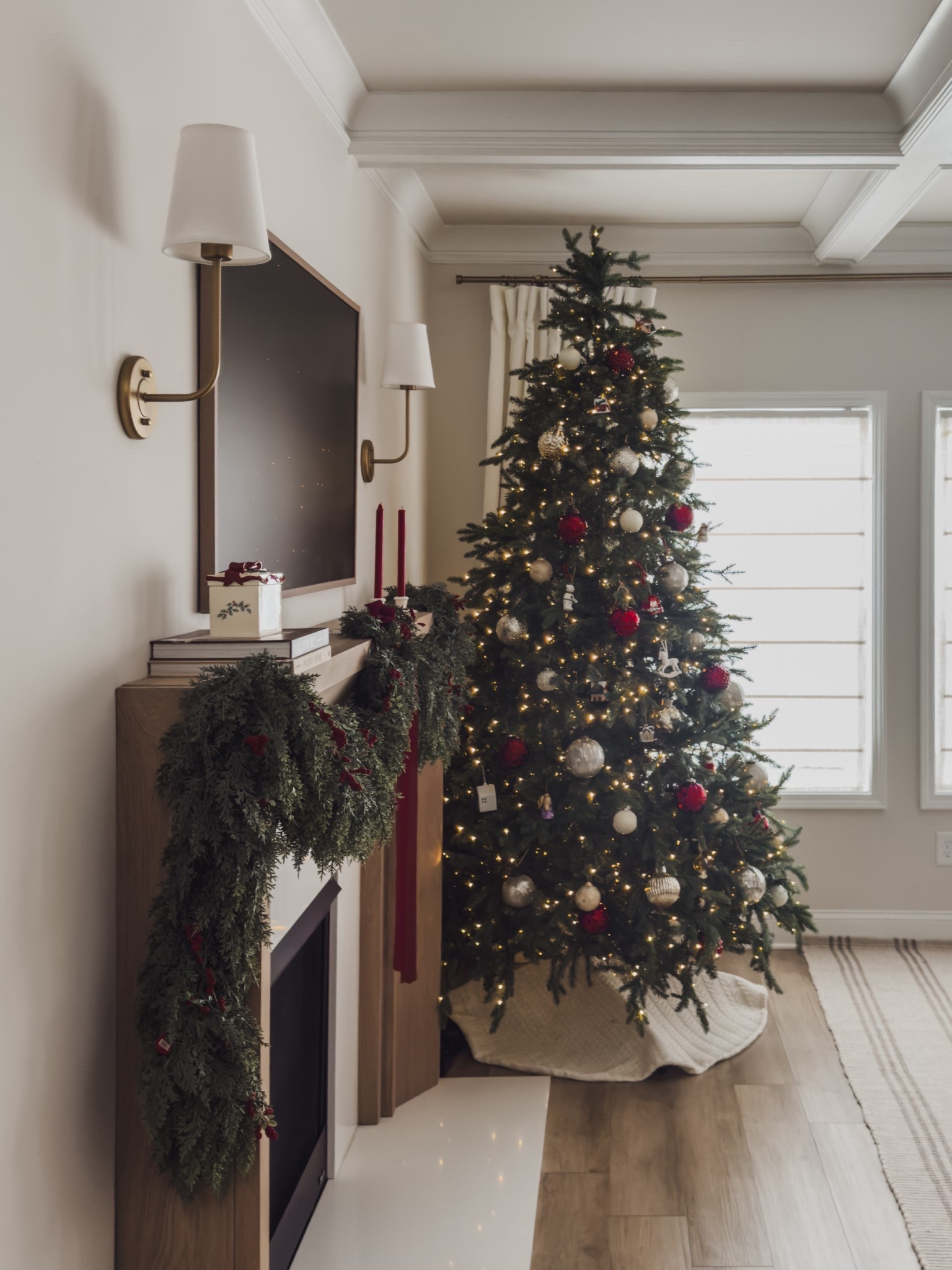 Another view of my King of Christmas tree. SO BEAUTIFUL. The garland in my mantel is a Hobby Libby find but sharing a great alternative 🤍 

Christmas decor, fireplace, home style, home inspo, living room, holiday decor, wayfair finds, shop the look! 

#LTKHoliday #LTKSaleAlert #LTKStyleTip