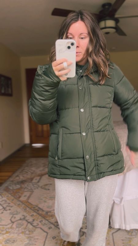 My coat is on sale for $29.99 today. I am wearing a size medium in the green- perfect for layering! It had little hand covers/warmers, snaps and zippers, fleece lined and an attached hood. 