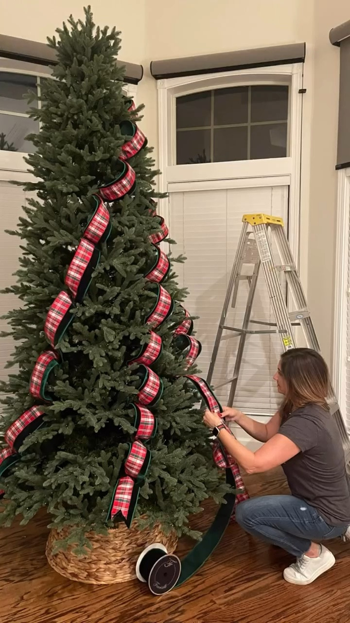 Ribbon is what sets the tone for every tree I create. I choose the ribbon first and the rest of the decor after. Then I decide how I’m going to run the ribbon. 

This part takes the most time for me, but it’s ALWAYS worth the effort. 

There are many tips I can share about ribbon but the very first one is to invest in high-quality ribbon. It truly makes a very big difference.  You can find the ribbon used in this tree through the link in my bio.  I’m always happy to help you with selection.

for this tree, I used a 4 inch emerald green velvet and layered a plaid over it.  
.
.
.
.
.
#ribbon  #wiredribbon #christmasribbon #ribbontutorial  #ribboning #christmasinjuly #christmastutorial #christmasvideo #christmastreestyling #christmasdecor #christmasdecorating #christmasdecorations #christmastree #christmasallyearlong #ribbontips #christmasinspo #traditionalchristmas #traditionalchristmasdecor #ltkchristmas #ltkholiday

#LTKHome