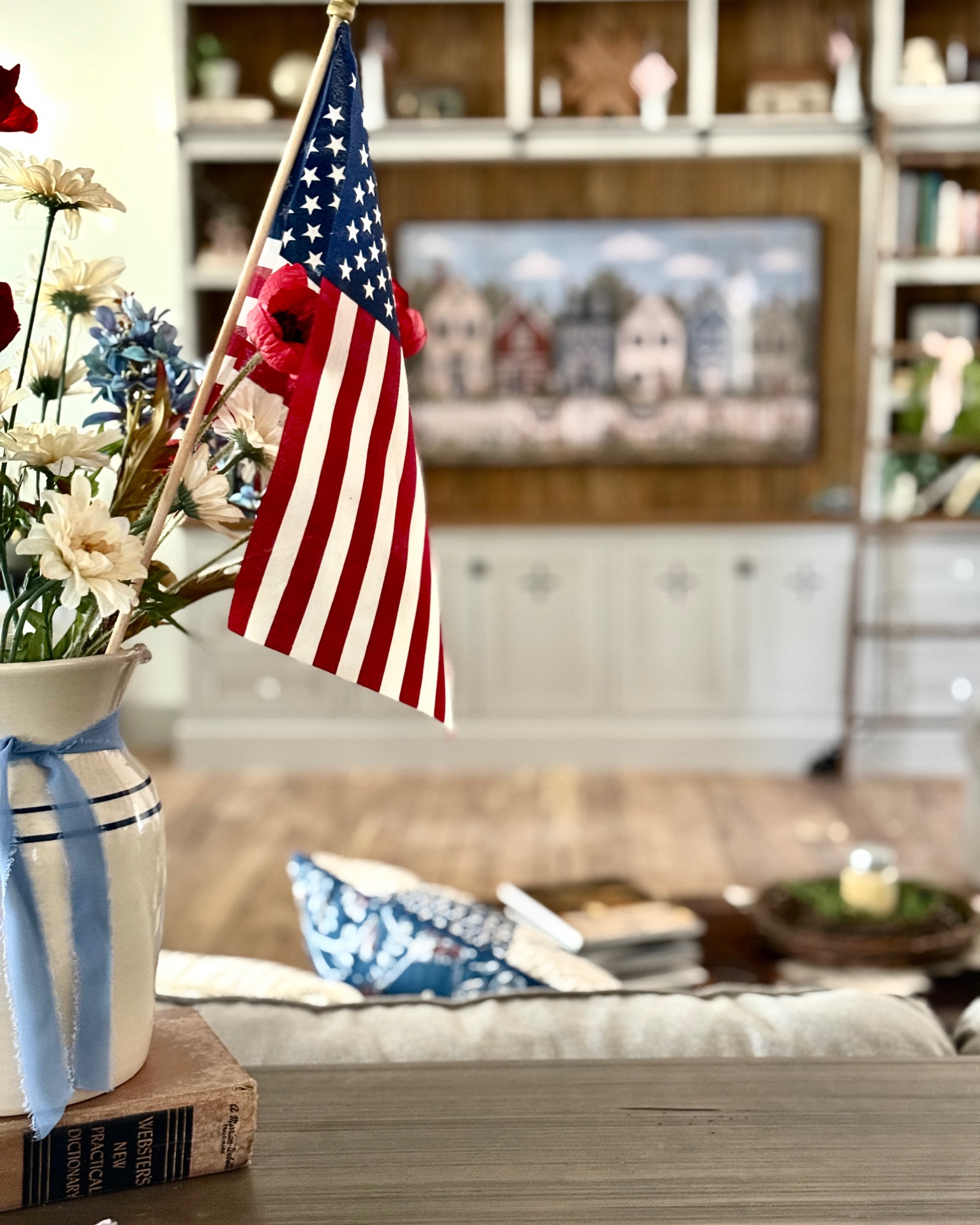 Hide your ugly frame tv with a beautiful American piece of art. It will look like a framed picture hanging on the wall.

#LTKHome #LTKSeasonal #LTKdayinmylife