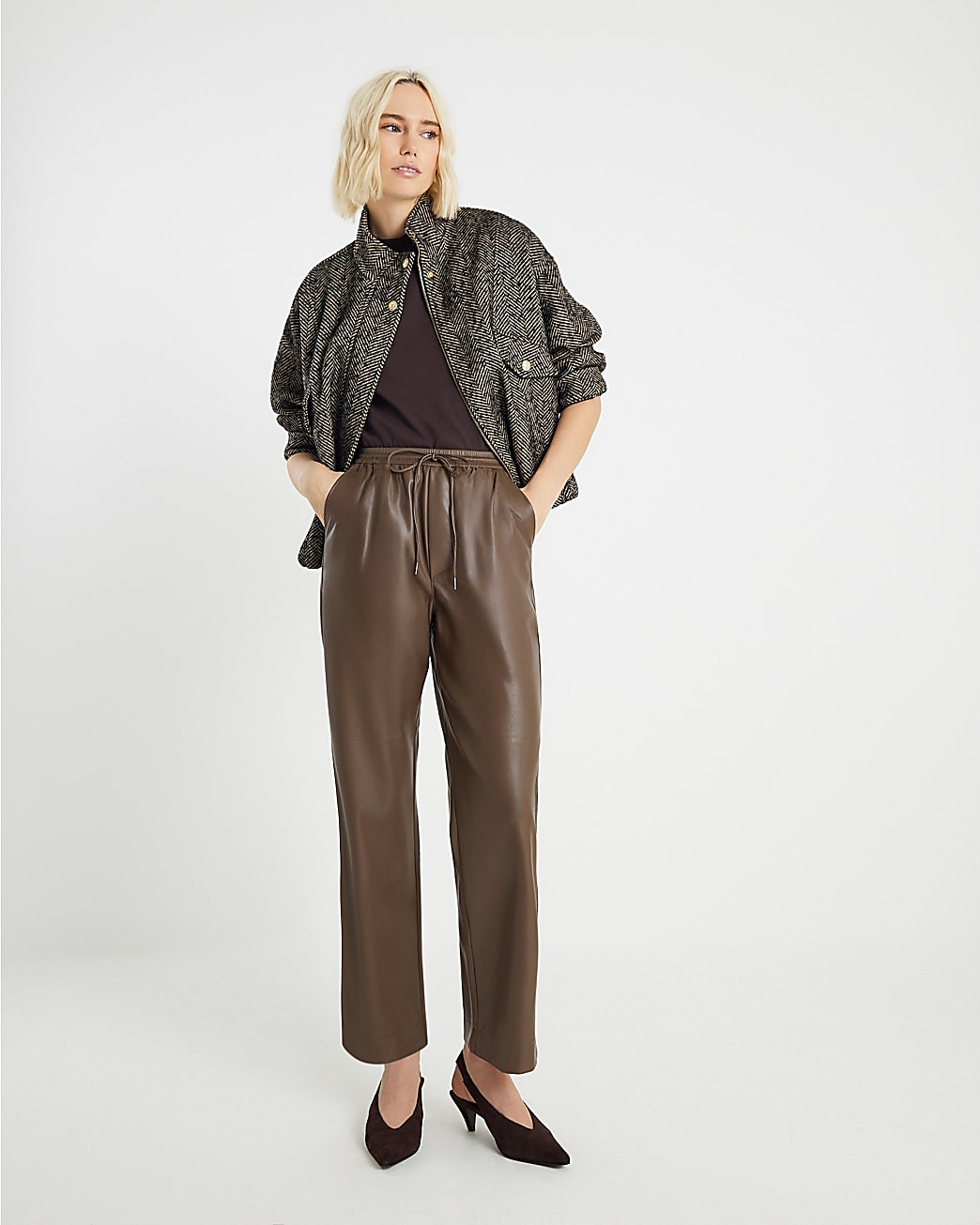 Brown Faux Leather Elasticated Waist Trousers | River Island UK & IE