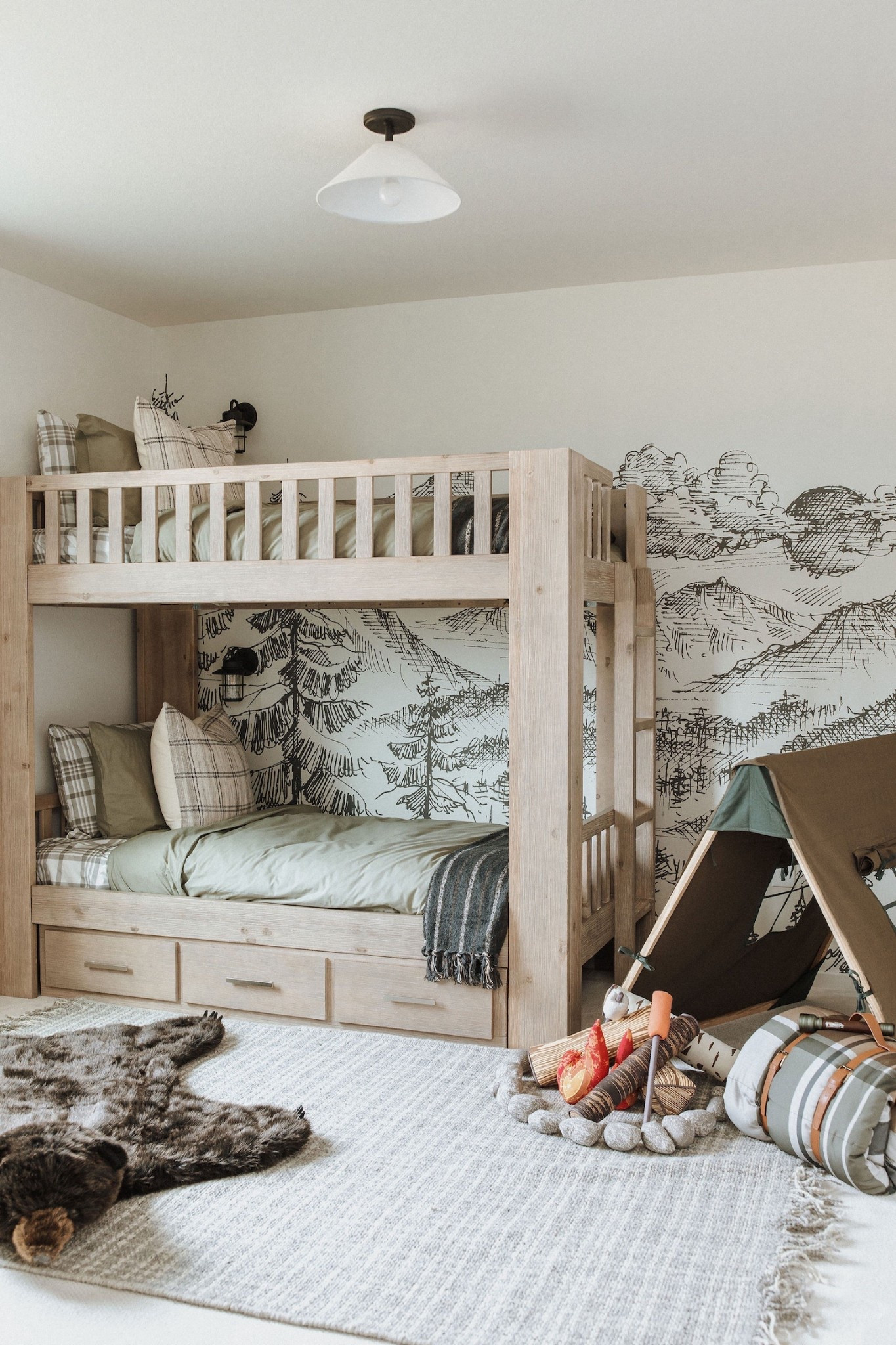 Every little boy’s dream! This campfire inspired bunk room was such a hit in one of the model homes we designed. The bunkbed is such a fun addition. 

 

#LTKStyleTip #LTKHome