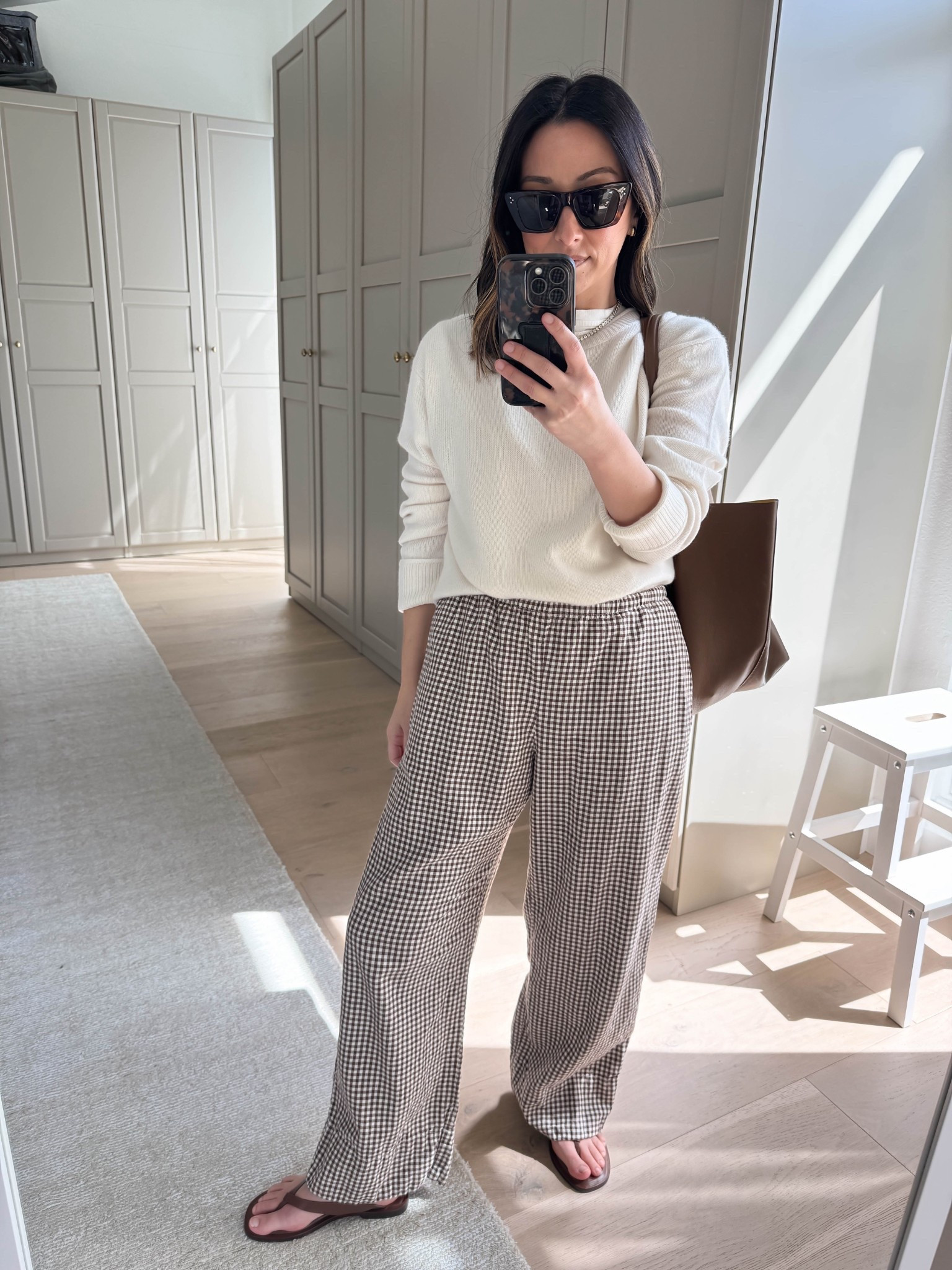 Comfy spring outfit idea. 

Quince boxy crewneck sweater small (but go TTS, could do the xs)
Gap linen pants petite xs
Everlane flip flops 5
Celine sunglasses 
Mansur Gavriel tote 

Spring outfits 2026, spring style, petite style 

#LTKmomlife #LTKSeasonal #LTKootd