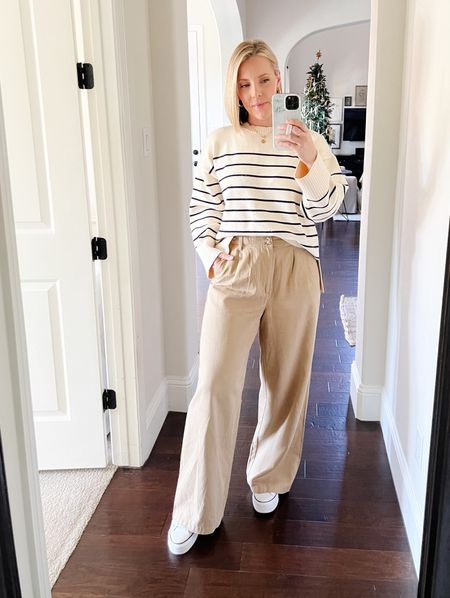 I’ve been reaching for these wide leg khaki pants a lot lately because they are so comfortable!  The sailor tabs at the waist make it a natural pairing with the navy striped sweater ⚓️

Size down in the pants!

#LTKover40 #LTKSeasonal