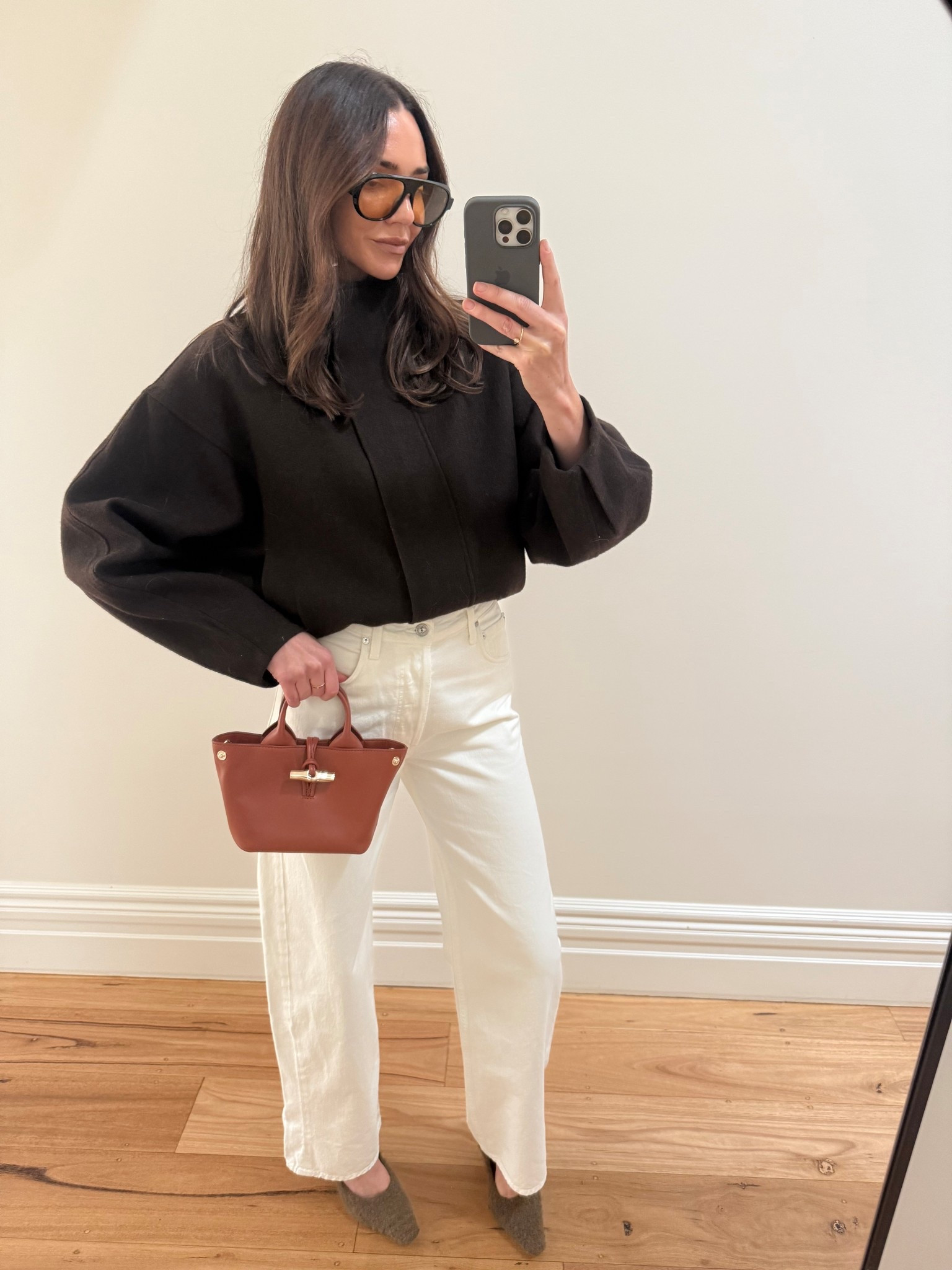 Autumn chic 

Chocolate bomber jacket 
White baggy high waisted jeans 
Tan Longchamp bag 
Oversized sunglasses 
Fluffy brown heels 

#LTKstyletip #LTKaustralia #LTKautumn