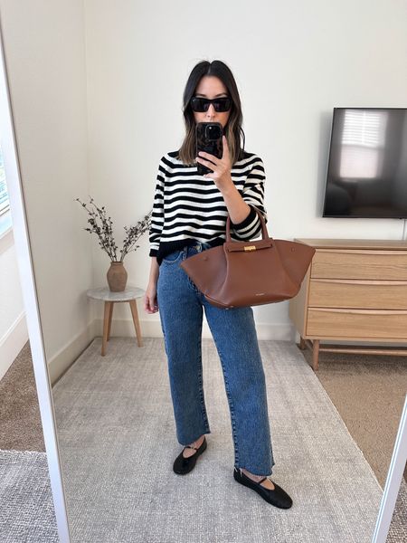 Everlane boxy cashmere sweater in stripes. One of my fav finds this fall! The black and white combo is so classic. 

Everlane sweater xs
Jcrew jeans petite 24
Jeffrey Campbell flats 5.5. Black runs s
DeMellier tote medium 
YSL sunglasses 

Spring outfits, purse, jeans 

#LTKsalealert #LTKitbag #LTKshoecrush