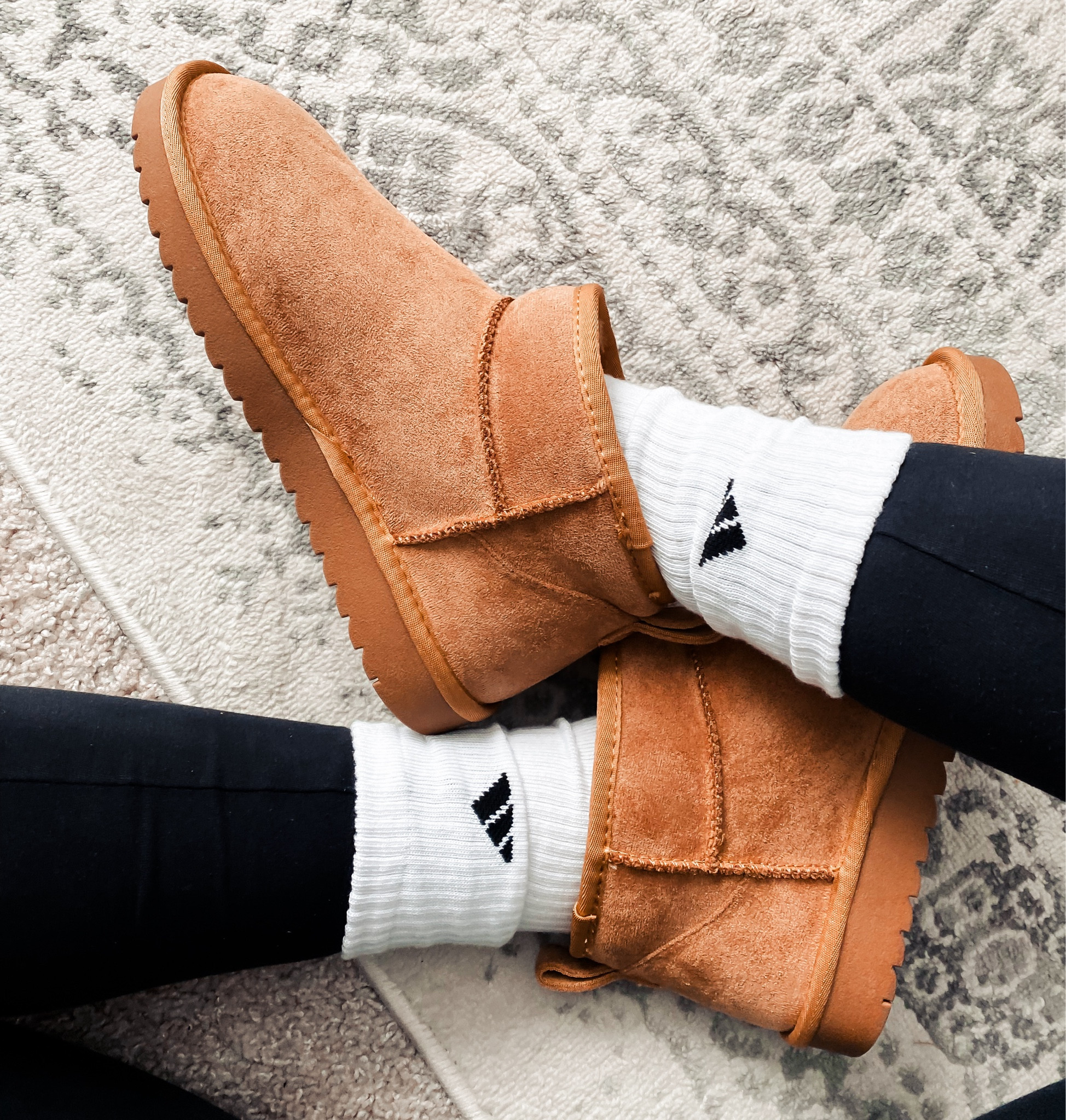 Mini ankle boots under $40! Ugg mini, winter boots, tan boots, Nike socks, athletic look, travel outfit, casual outfit. 

#LTKsalealert #LTKstyletip #LTKfindsunder50