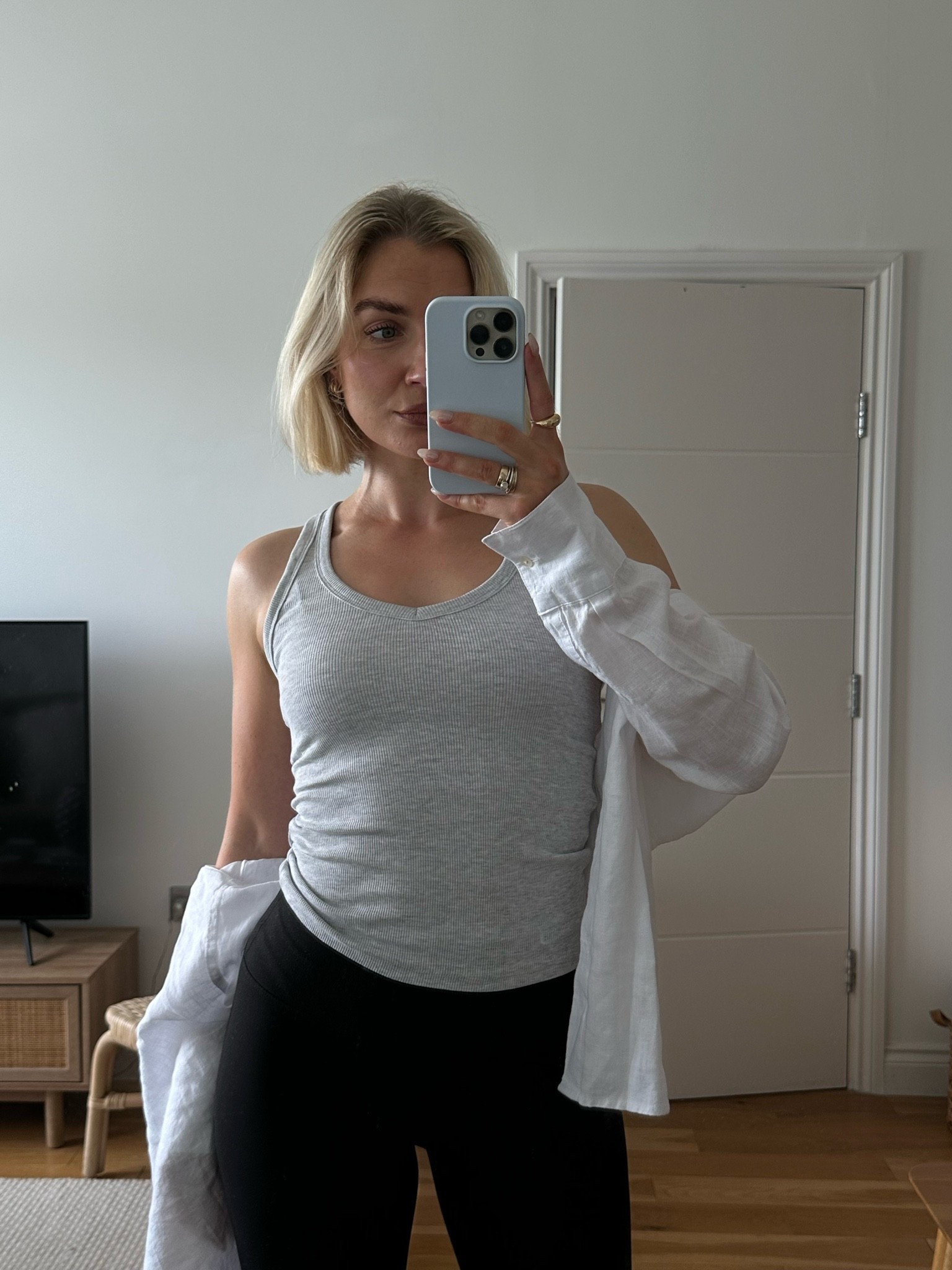 Grey vest top 
White linen shirt 
Black capri pants

#LTKgrwm #LTKootd