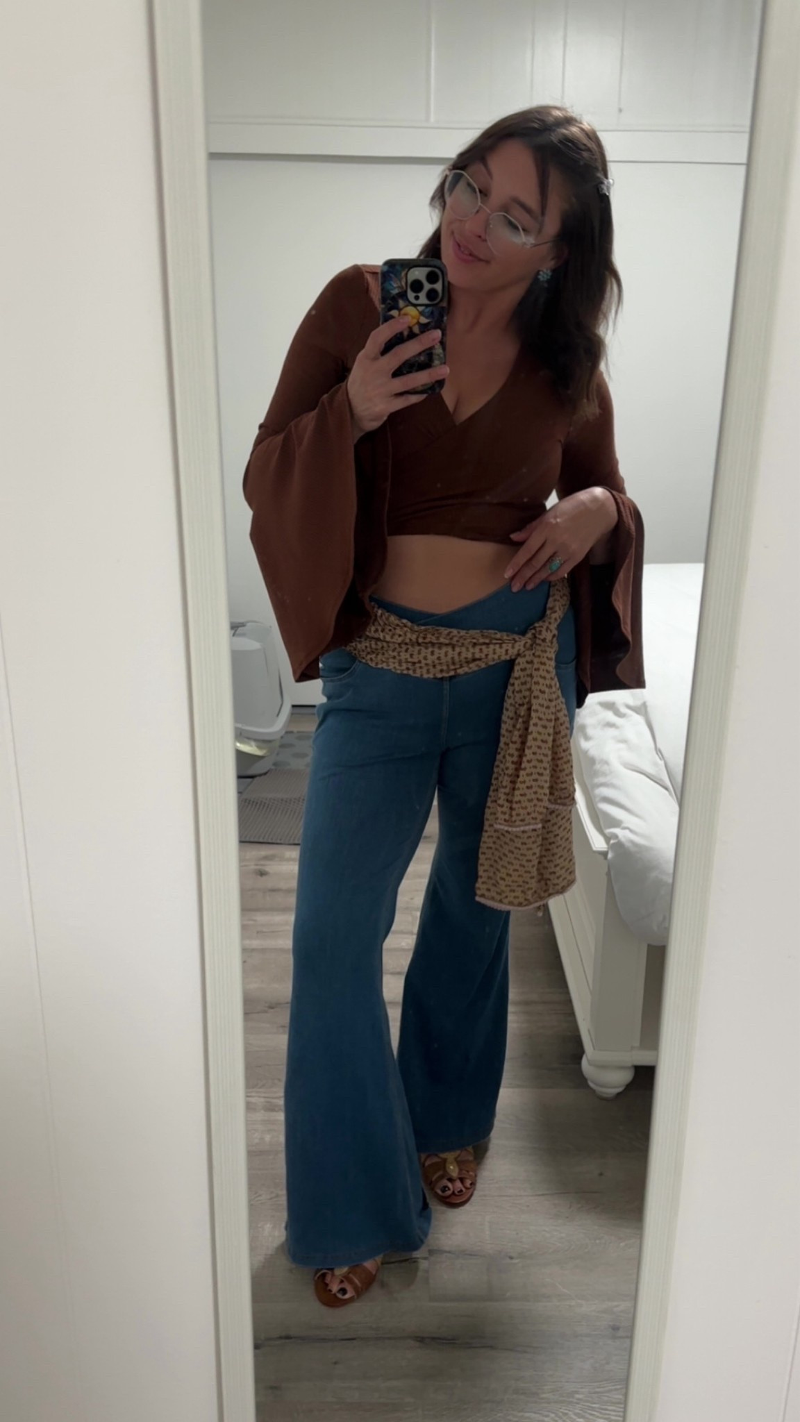 Take me back to the 1970s! Went out to the discoooo and this is what I was dancing in all night!! Blue bell bottom comfy stretchy pants wrapped in a scarf to match my hippie large sleeved v neck tie shirt that shows just enough. And I am loving these extremely comfy wedges, I will be wearing them dancing more often!! 🪩🕺🏽 

#LTKSeasonal #LTKStyleTip #LTKParties
